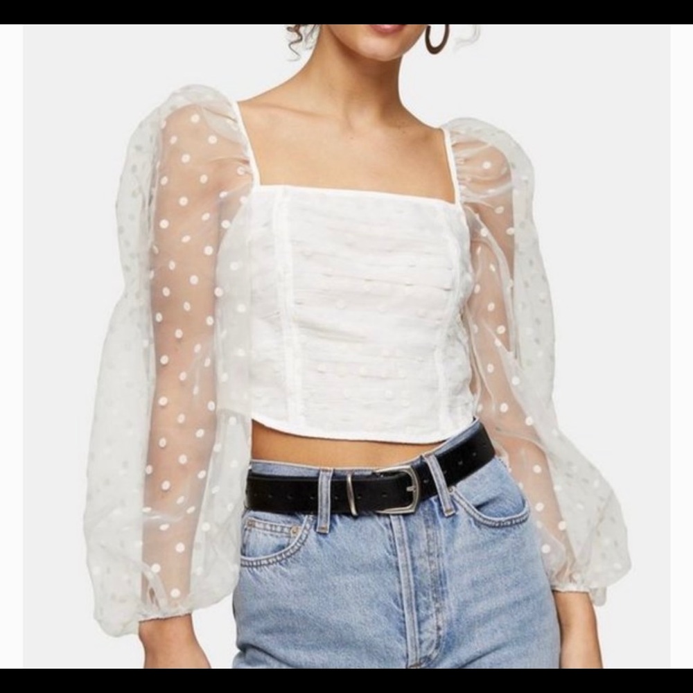 long sleeve, polka dot shirt with sheer sleeves